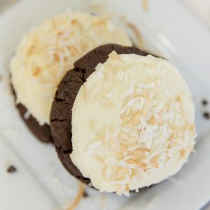Huge dark chocolate cookie topped in sweet coconut buttercream and fresh toasted coconut