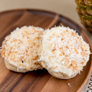 Thick sugar cookie, incredible flavor, sweet coconut buttercream, sprinkled with real toasted coconut