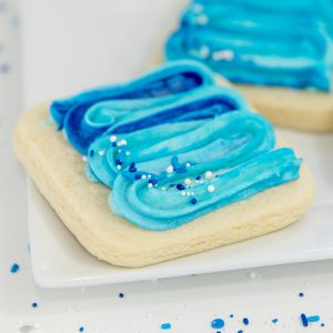 Thick, buttery sugar cookie, topped with rich buttercream frosting, decorated for Father's Day